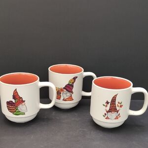 Sheffield Home Ceramic White/Orange Mug Set with Whimsical Gnome Designs.